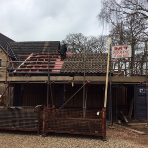 Detached Garage Tiled Using Reclaimed Pan Tiles